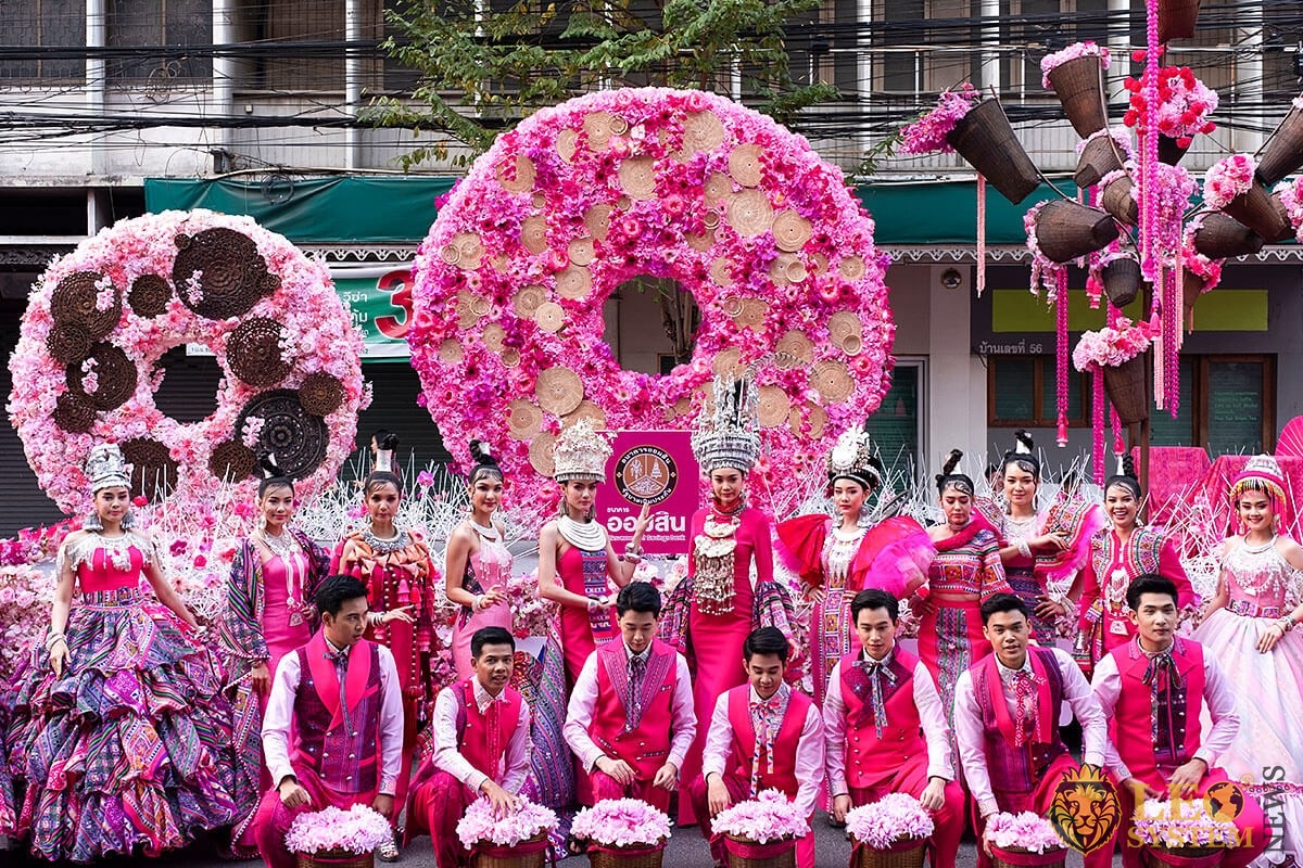 View of men and women at the Annual Flower Parade, Chiang Mai, Thailand