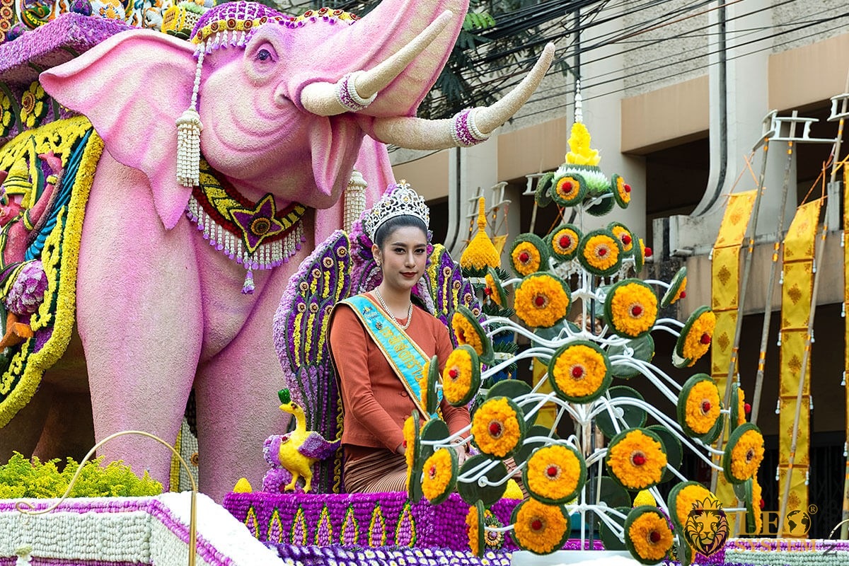 Image of a girl sitting in a flower float - Flower Festival Parade, Chiang Mai, Thailand