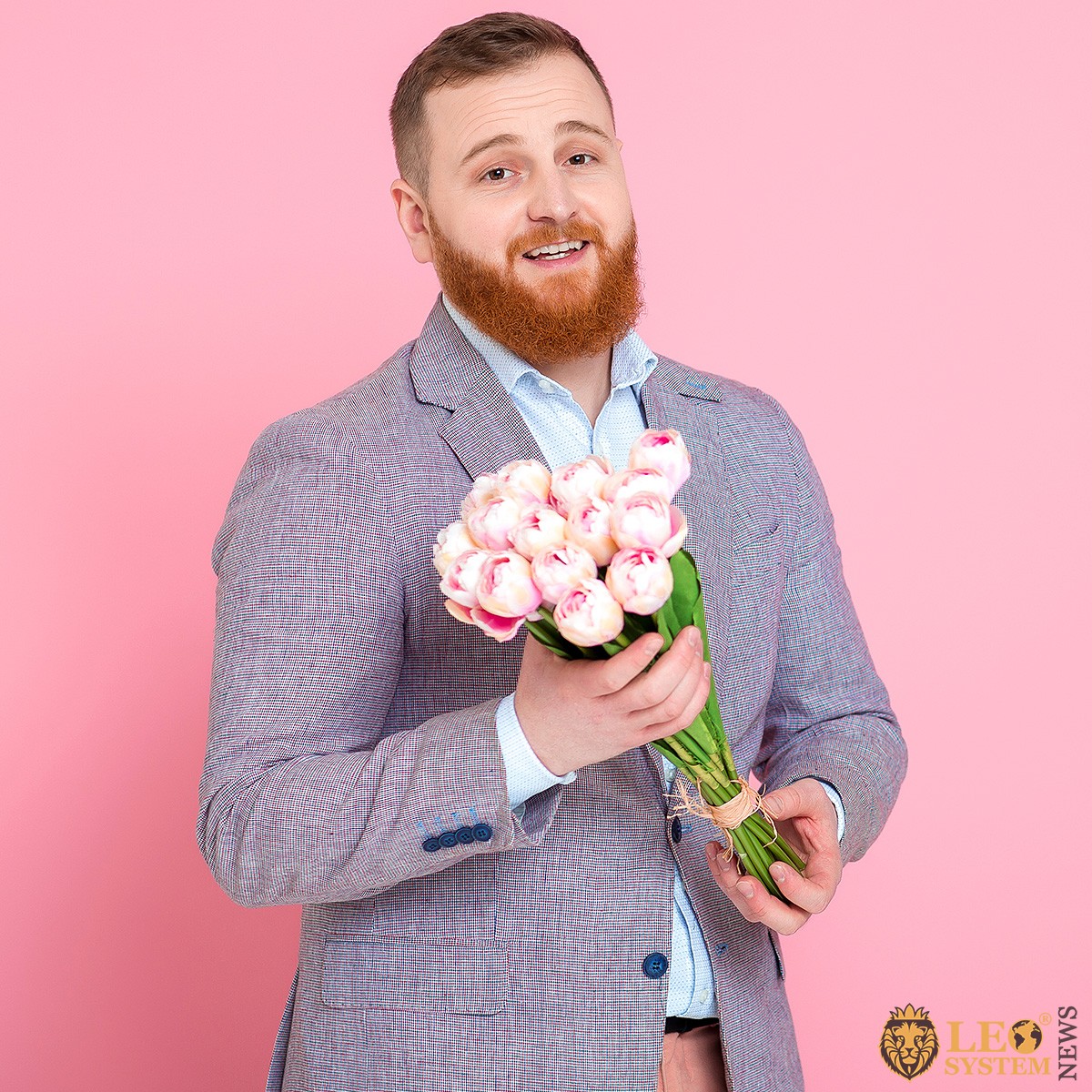 Image of a handsome man with a bouquet of flowers