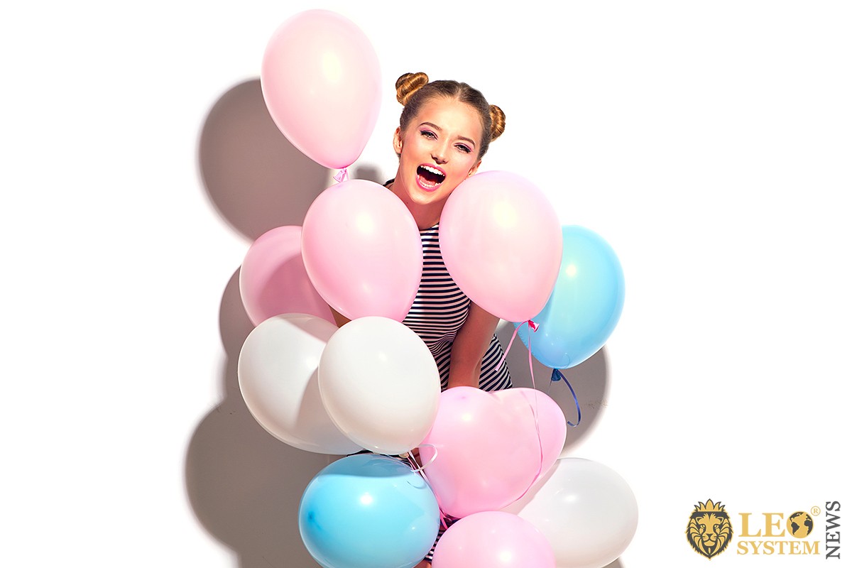 Image of a girl with balloons