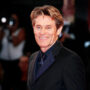 Image of American actor Willem Dafoe in a beautiful suit