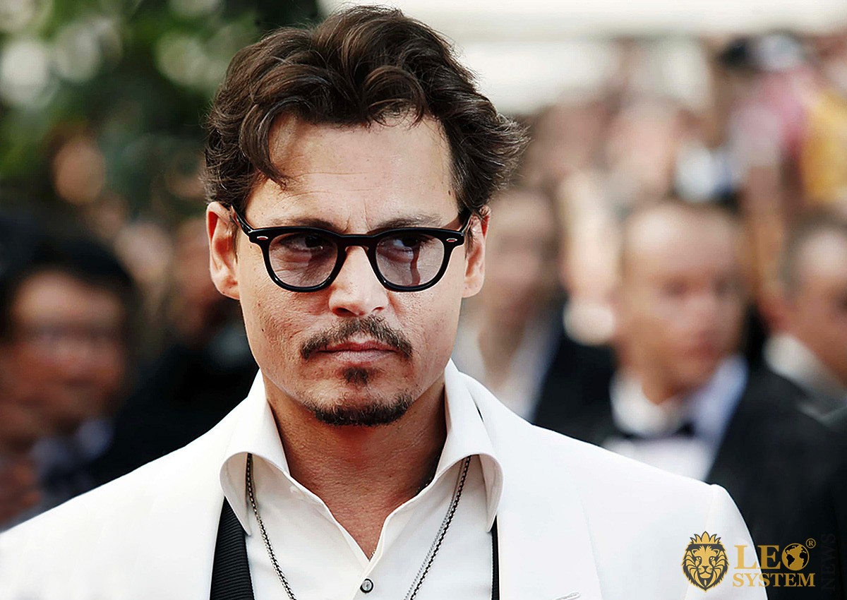 Image of Johnny Depp in fashionable glasses