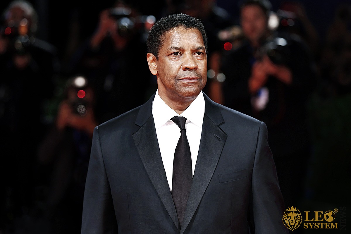 Image of Denzel Washington in a white shirt and tie