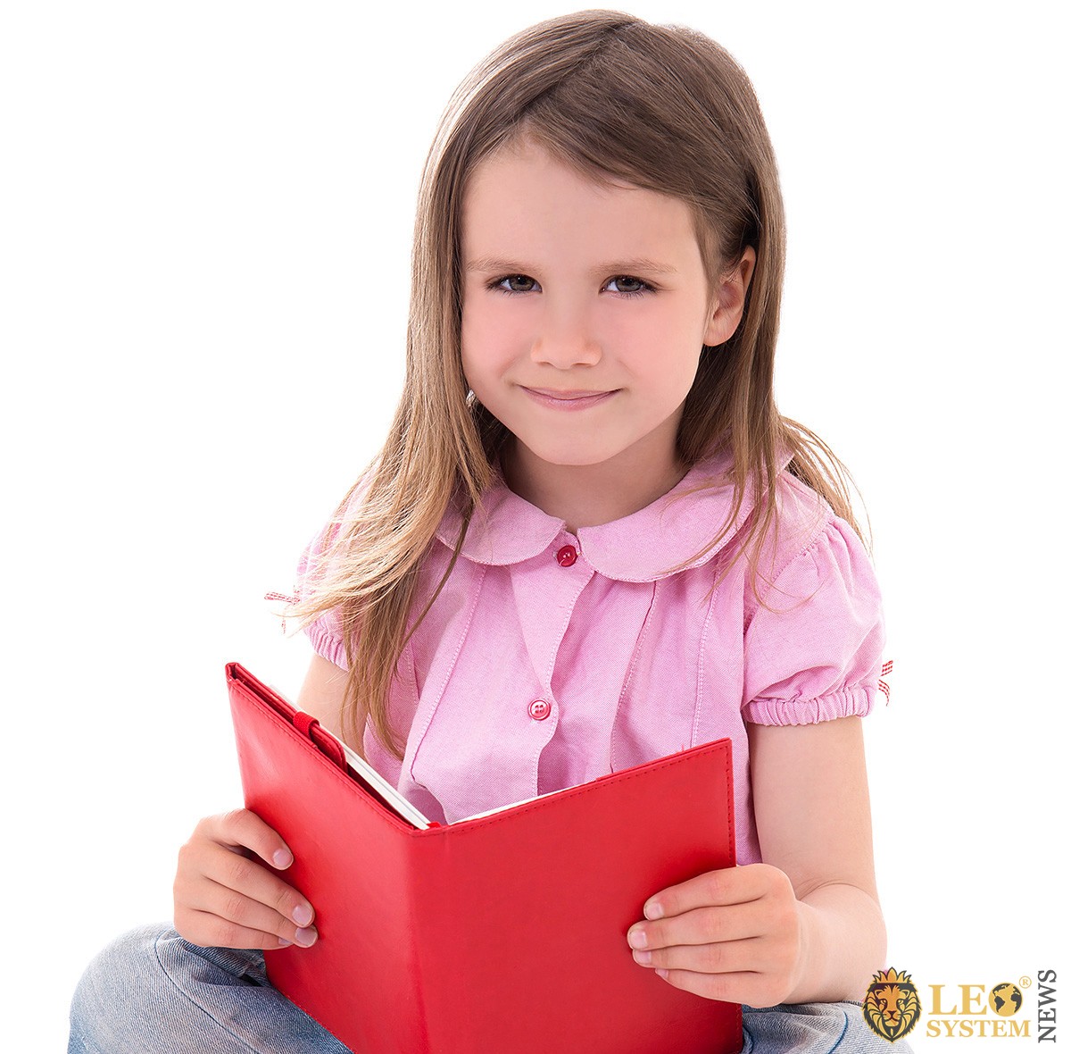 Image of a young girl with a book in her hands