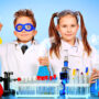 Image of two children doing research and education
